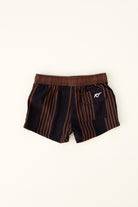 backside of espresso colored Trendy swim shorts with an elastic waistband and drawstring, made from quick-drying fabric. Ideal for swimming, beach trips, and outdoor activities. Features vibrant patterns and a comfortable fit for active kids.