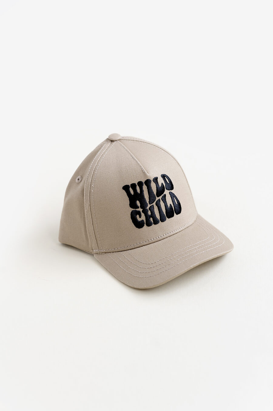 A ran snapback by rad toddler. The front of the hat says WILD CHILD and Comes in different sizes and looks very stylish