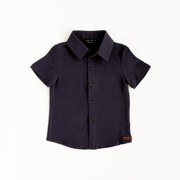 Charcoal colored button up shirt for kids. Looks stylish and has a leather patch at the bottom of the shirt